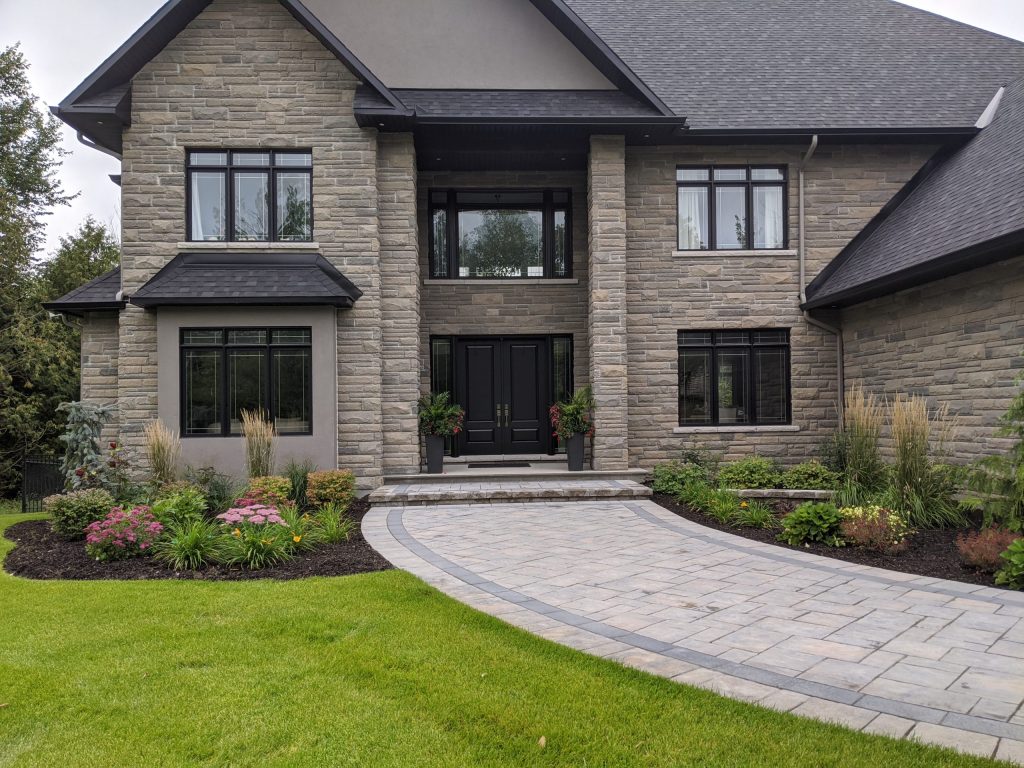 The front garden of a house designed by Pick plant and prune